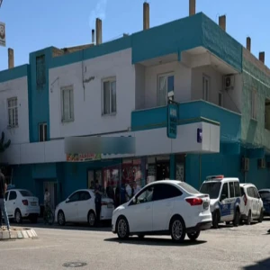 Şanlıurfa’da market camı kurşunlandı iddiası!