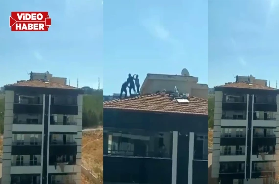 Çatıda birbirlerini ittiler