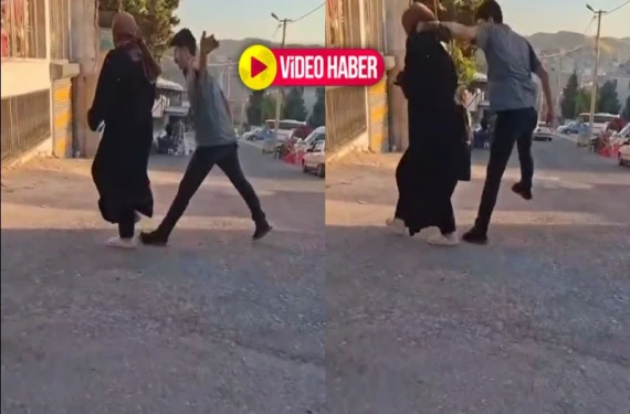 Eşini sokak ortasında darp etti