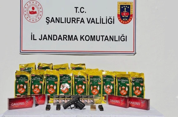 Silahın yanında kaçak ürünler de çıktı