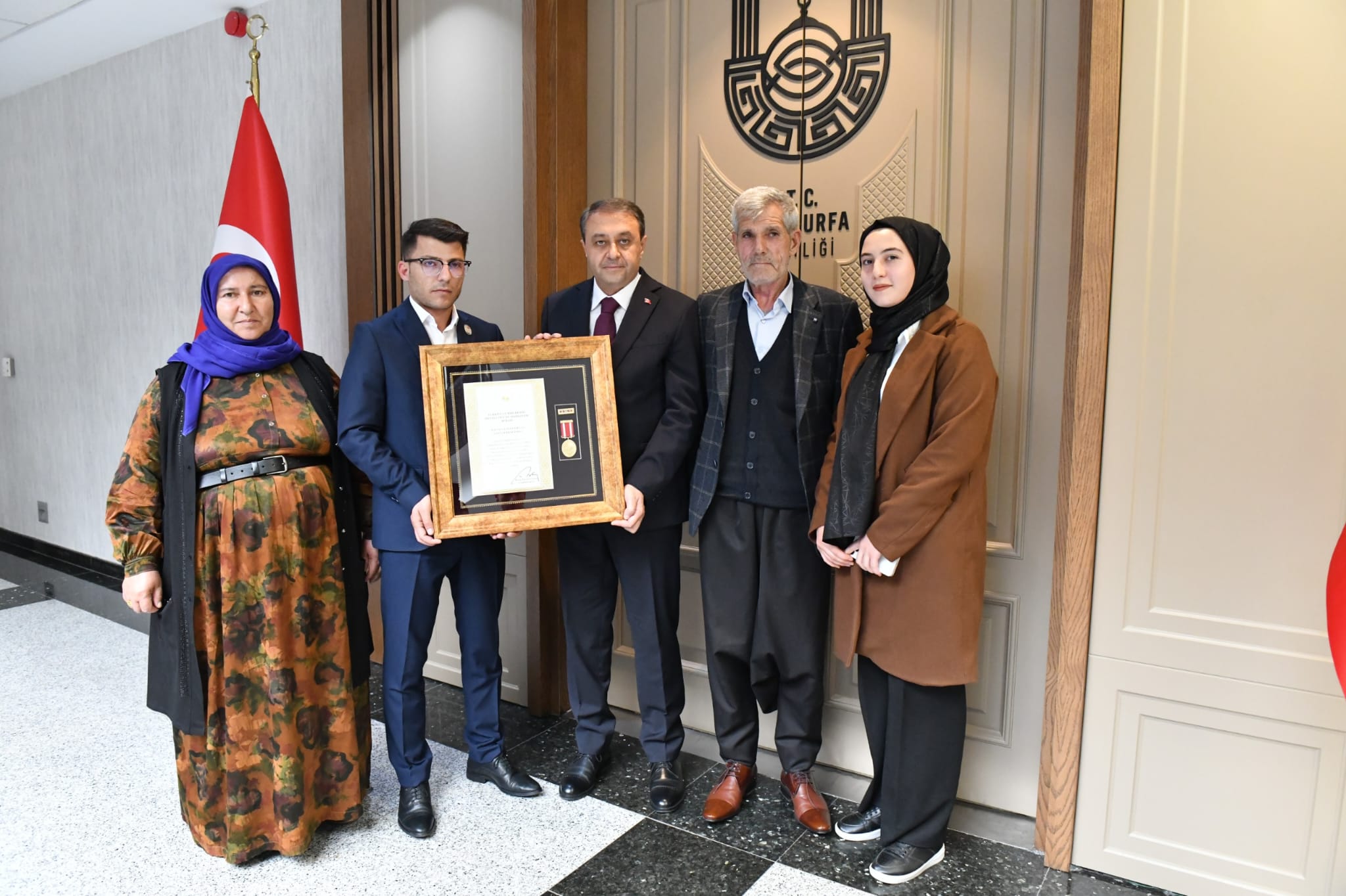 Şanlıurfa'da şehit ve gazi yakınlarına devlet övünç madalyası...Cumhurbaşkanı gönderdi